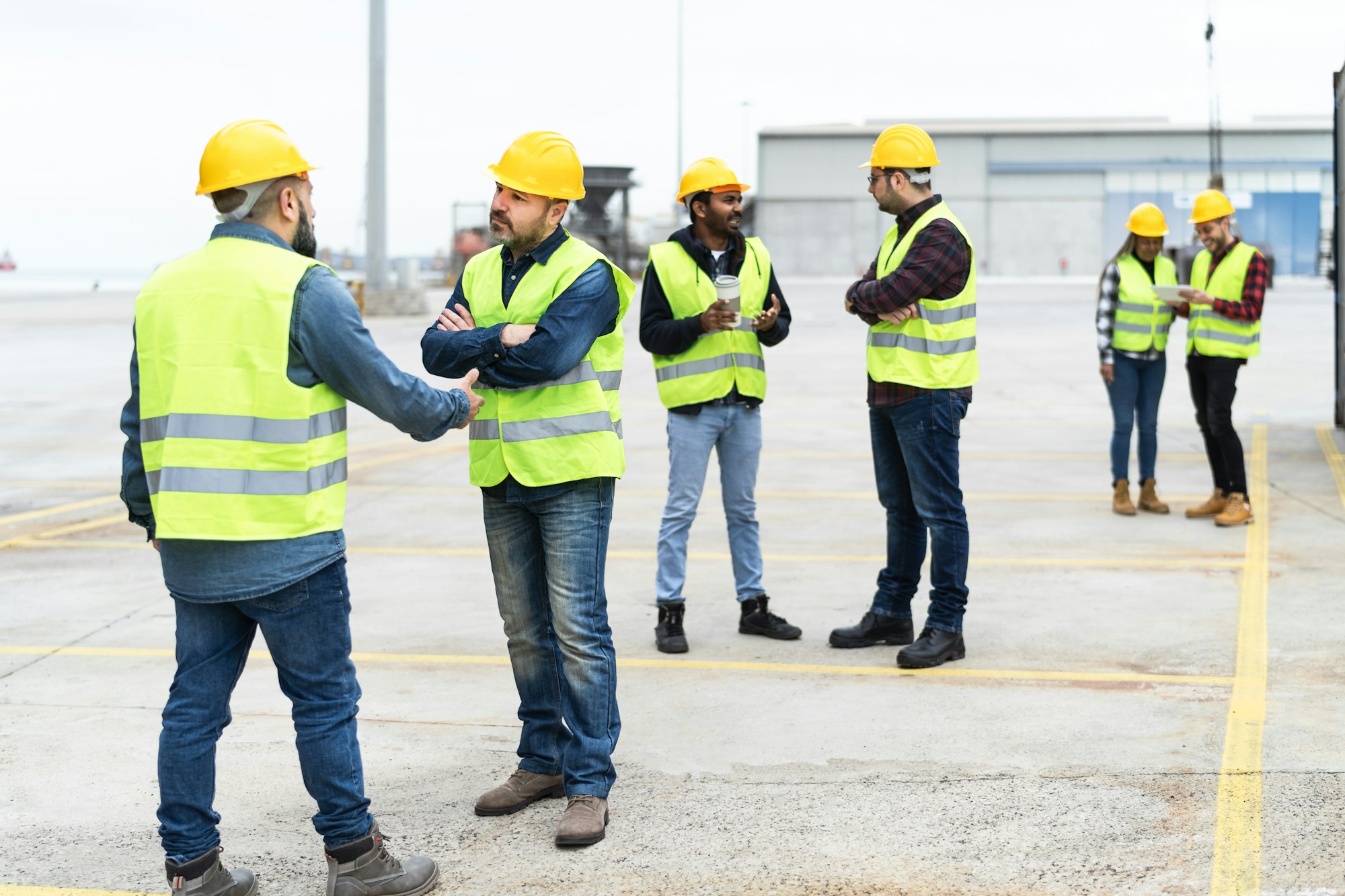 Industrial engineers working in logistic terminal of container cargo