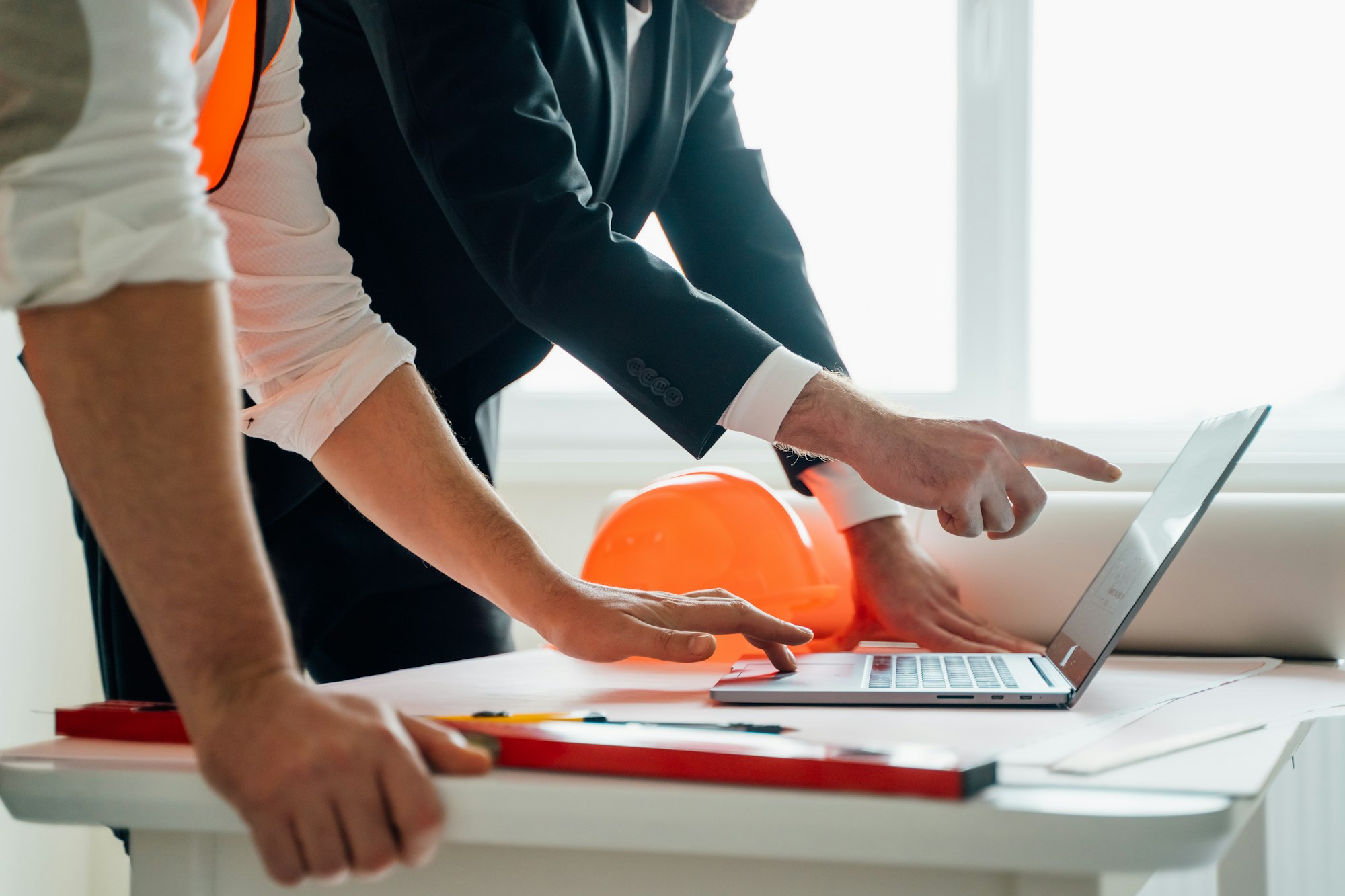 close up of Male contactor and entrepreneur using laptop.