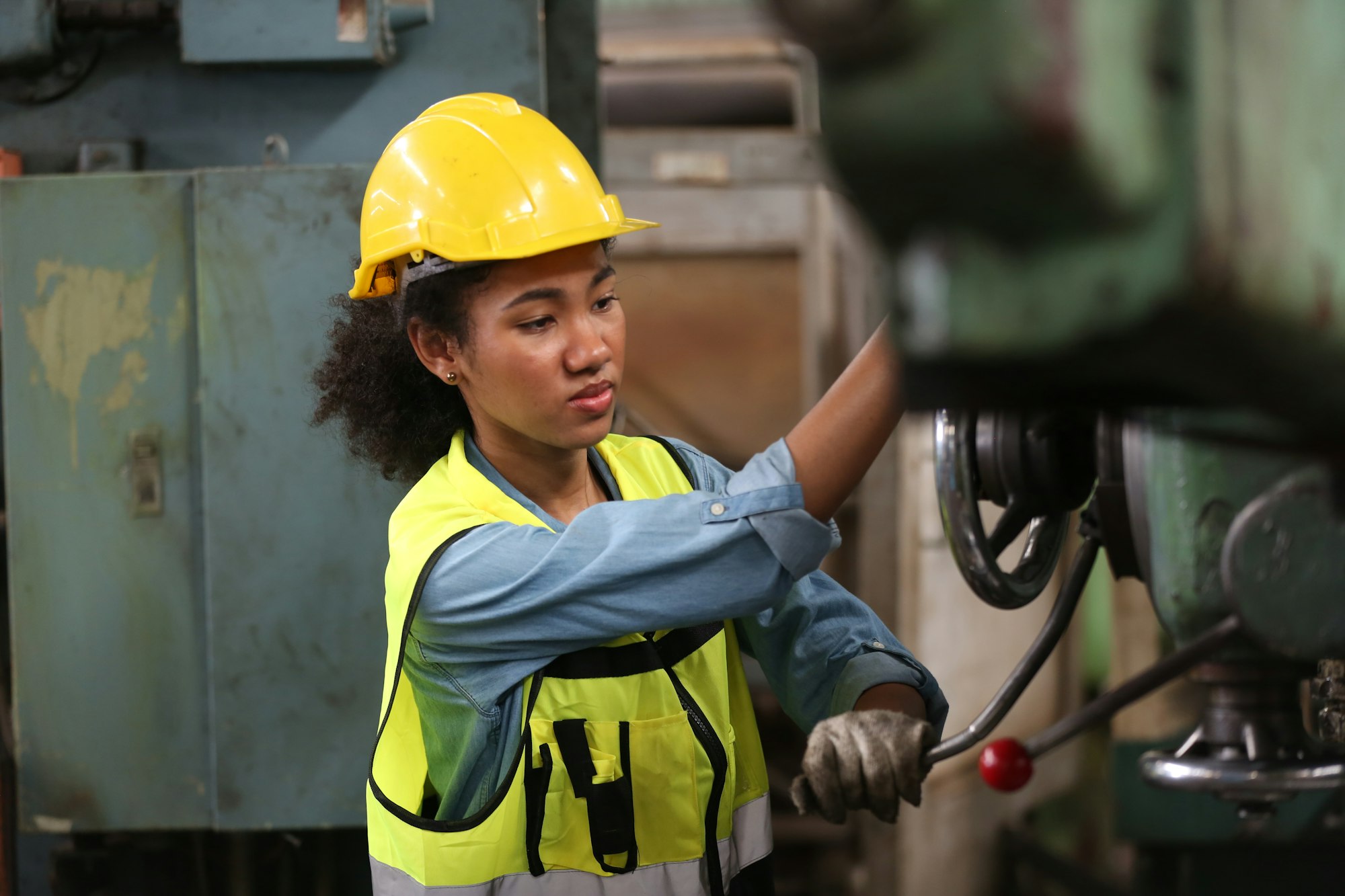 industrial factory employee working in metal manufacturing industry