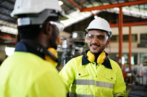 industrial factory worker working in metal manufacturing industry